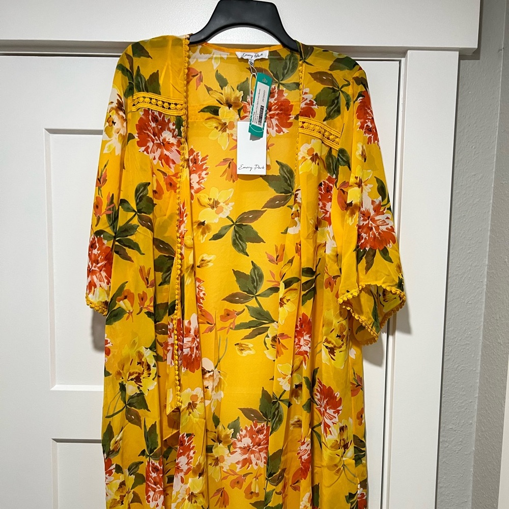 Large yellow floral bathing suit cover.